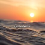 picture of ocean waves during sunset with words contentment displayed on the waves